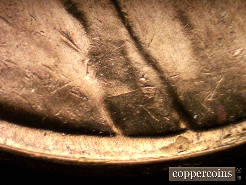 Die-stage B marker on 1961D•1MM•004 (1961 Repunched Mint Mark).