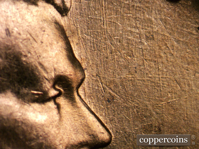 Die-stage B marker on 1961D•1MM•004 (1961 Repunched Mint Mark).