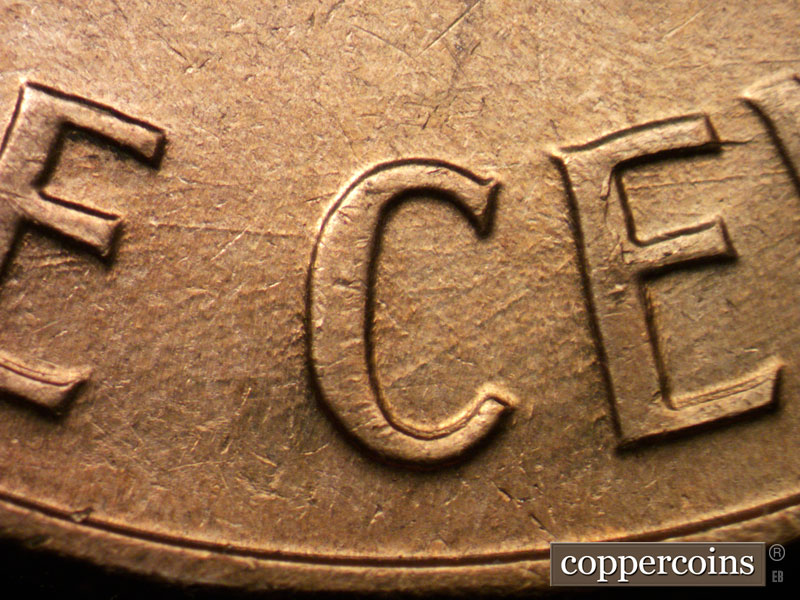 Die-stage B marker on 1961D•1MM•004 (1961 Repunched Mint Mark).