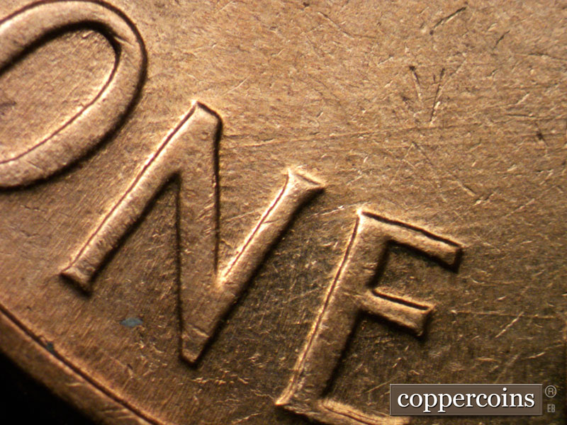Die-stage B marker on 1961D•1MM•004 (1961 Repunched Mint Mark).