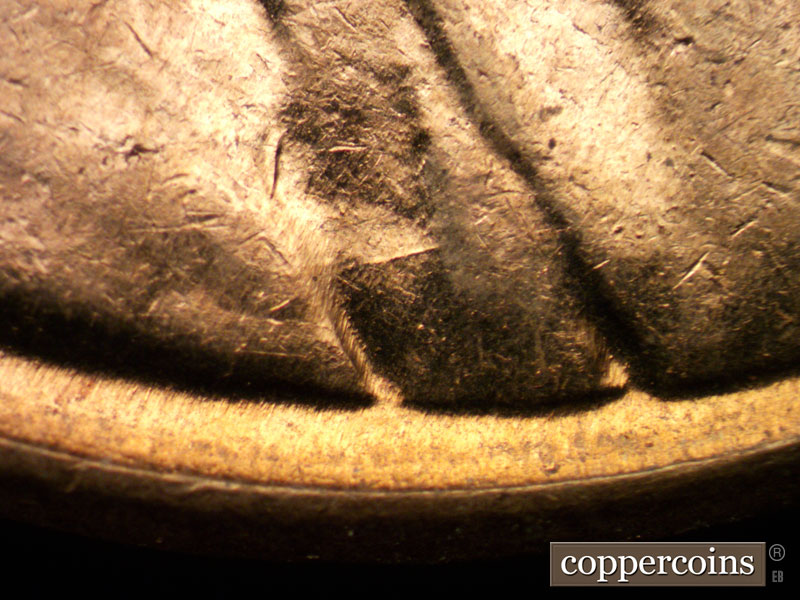 Die-stage C marker on 1961D•1MM•004 (1961 Repunched Mint Mark).