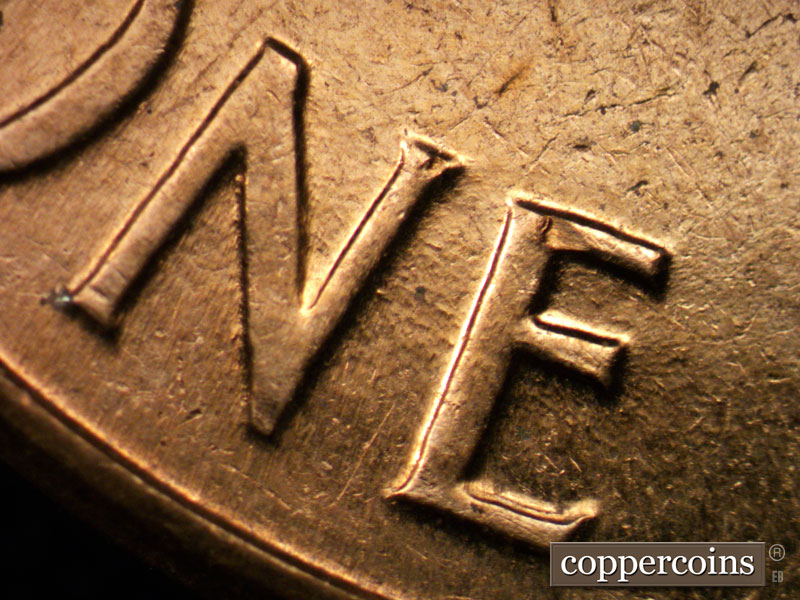 Die-stage C marker on 1961D•1MM•004 (1961 Repunched Mint Mark).