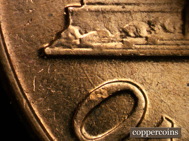 Die-stage C marker on 1961D•1MM•004 (1961 Repunched Mint Mark).