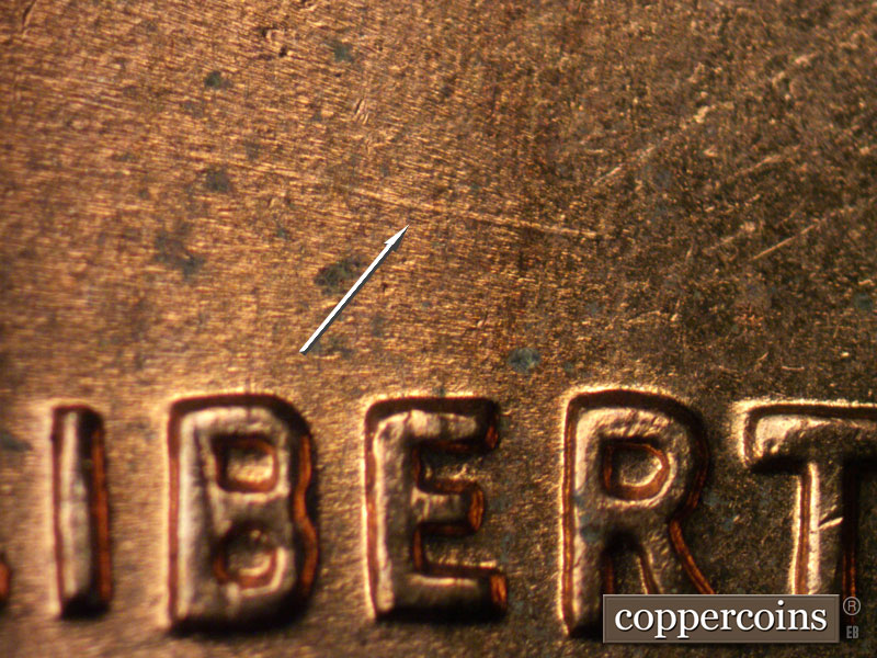 Die-stage B marker on 1961D•1MM•012 (1961 Repunched Mint Mark).