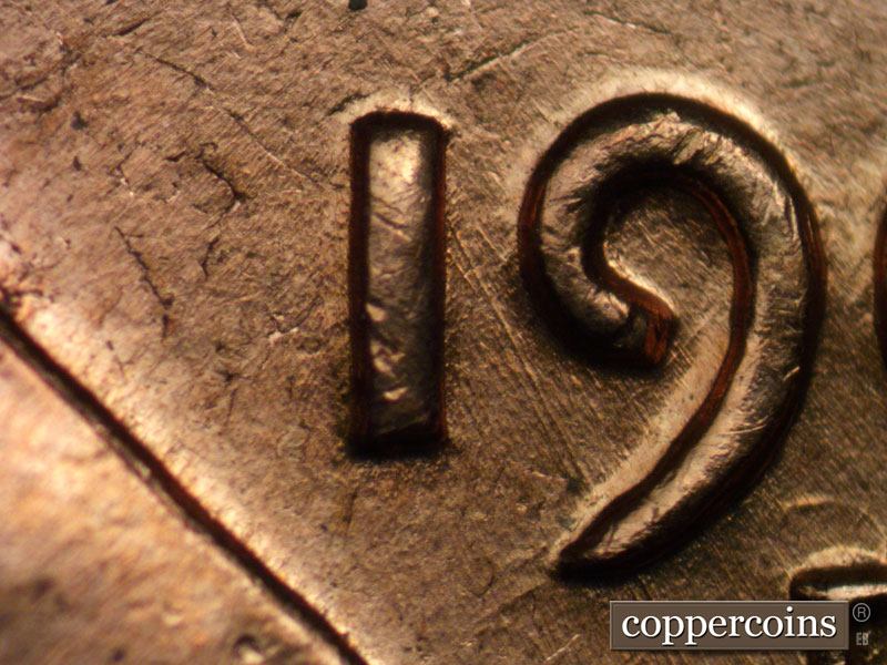 Die-stage B marker on 1961D•1MM•014 (1961 Repunched Mint Mark).