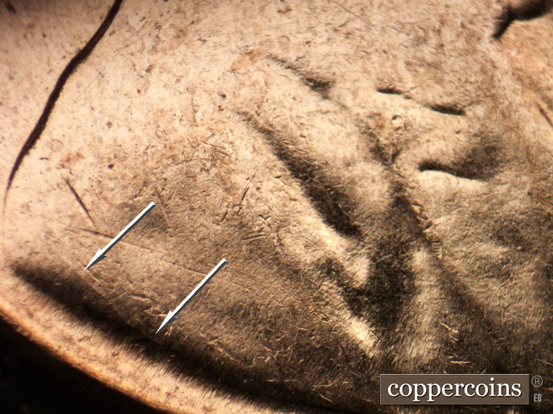 Die-stage C marker on 1961D•1MM•021 showing Light die crack near VDB.