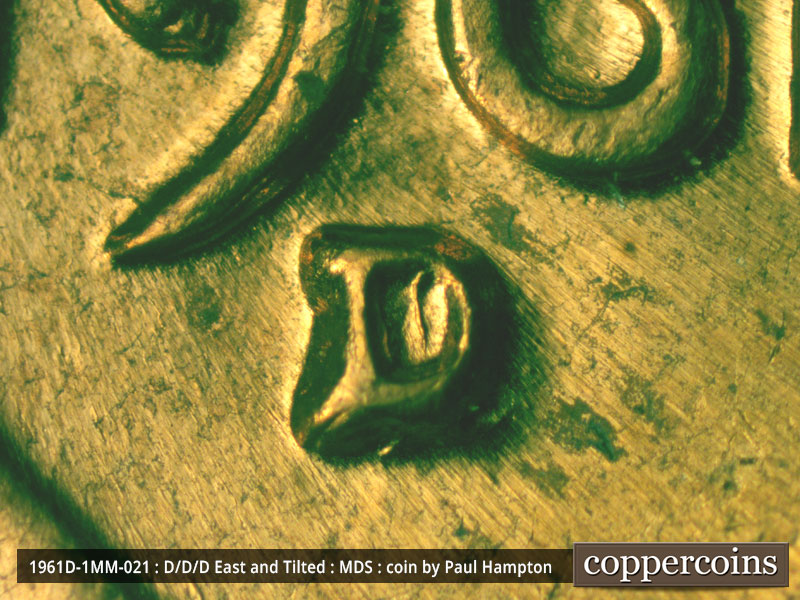 Die-stage A marker on 1961D•1MM•021 showing Closeup of repunched mint mark.