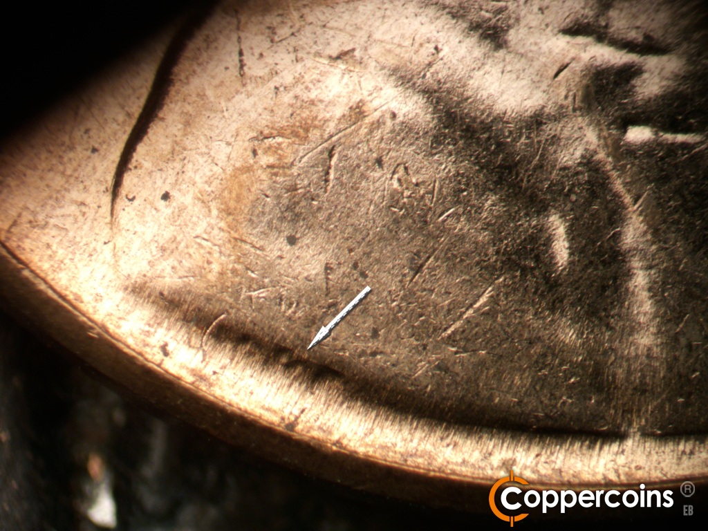 Die-stage B marker on 1961D•1MM•021 showing Die crack over VDB.