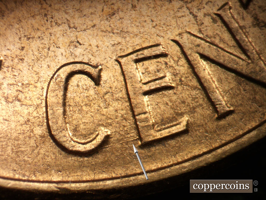 Die-stage B marker on 1961D•1MM•035 showing Concentric scratch from bottom of E in CENT.