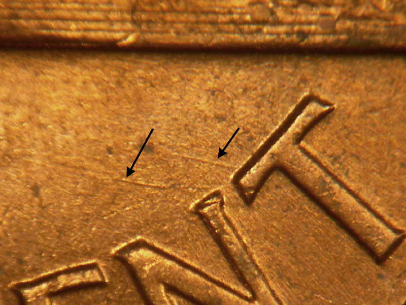 Die-stage B marker on 1961D•1MM•042 (1961 Repunched Mint Mark).