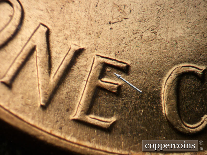 Die-stage B marker on 1961D•1MM•043 (1961 Repunched Mint Mark).