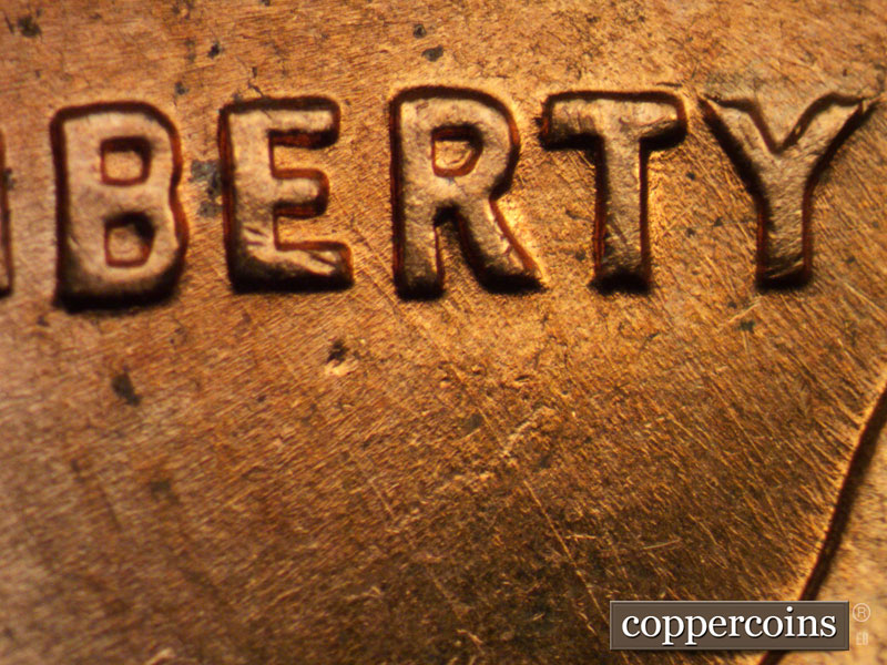 Die-stage B marker on 1961D•1MM•047 (1961 Repunched Mint Mark).
