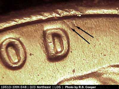 Die-stage B marker on 1961D•1MM•048 (1961 Repunched Mint Mark).