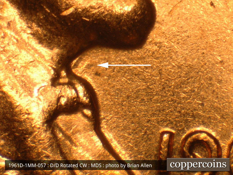 Die-stage B marker on 1961D•1MM•057 (1961 Repunched Mint Mark).