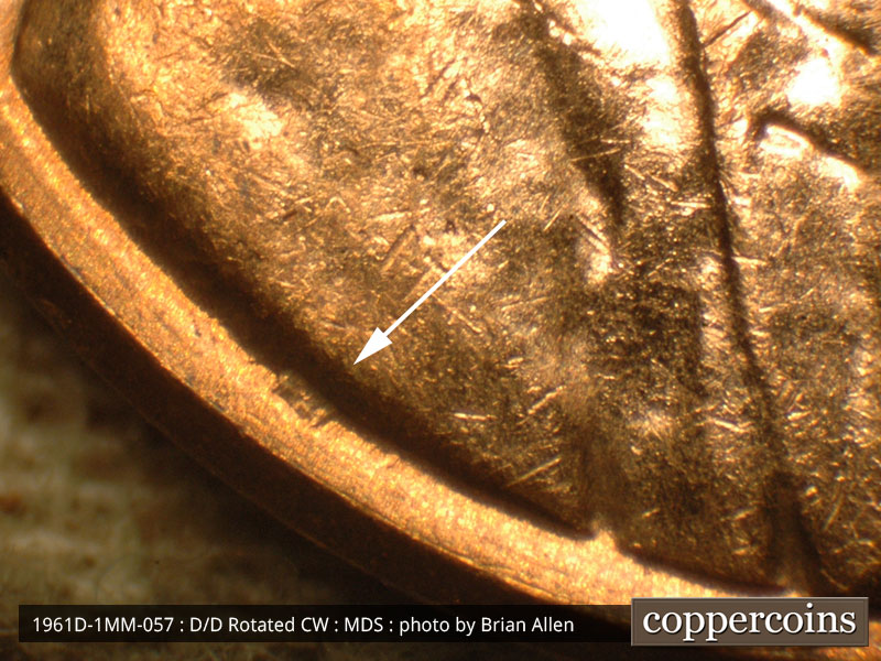 Die-stage B marker on 1961D•1MM•057 (1961 Repunched Mint Mark).