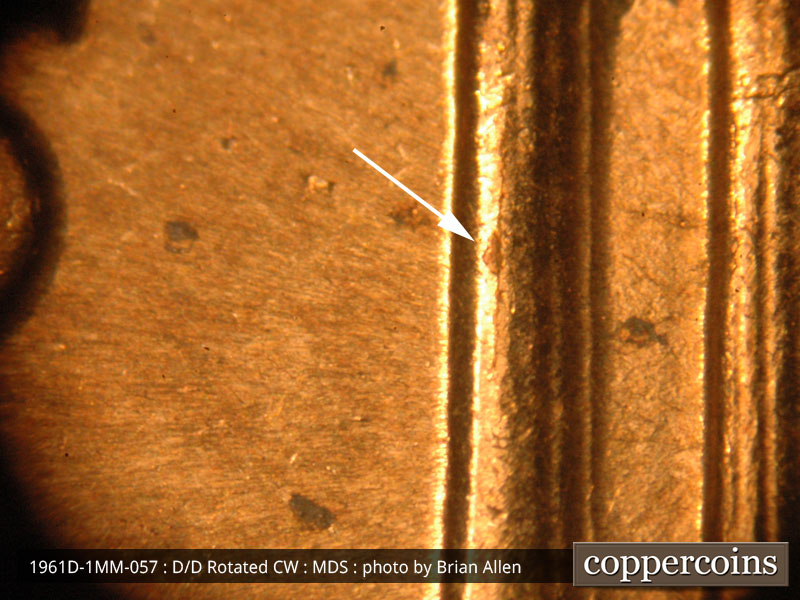 Die-stage B marker on 1961D•1MM•057 (1961 Repunched Mint Mark).