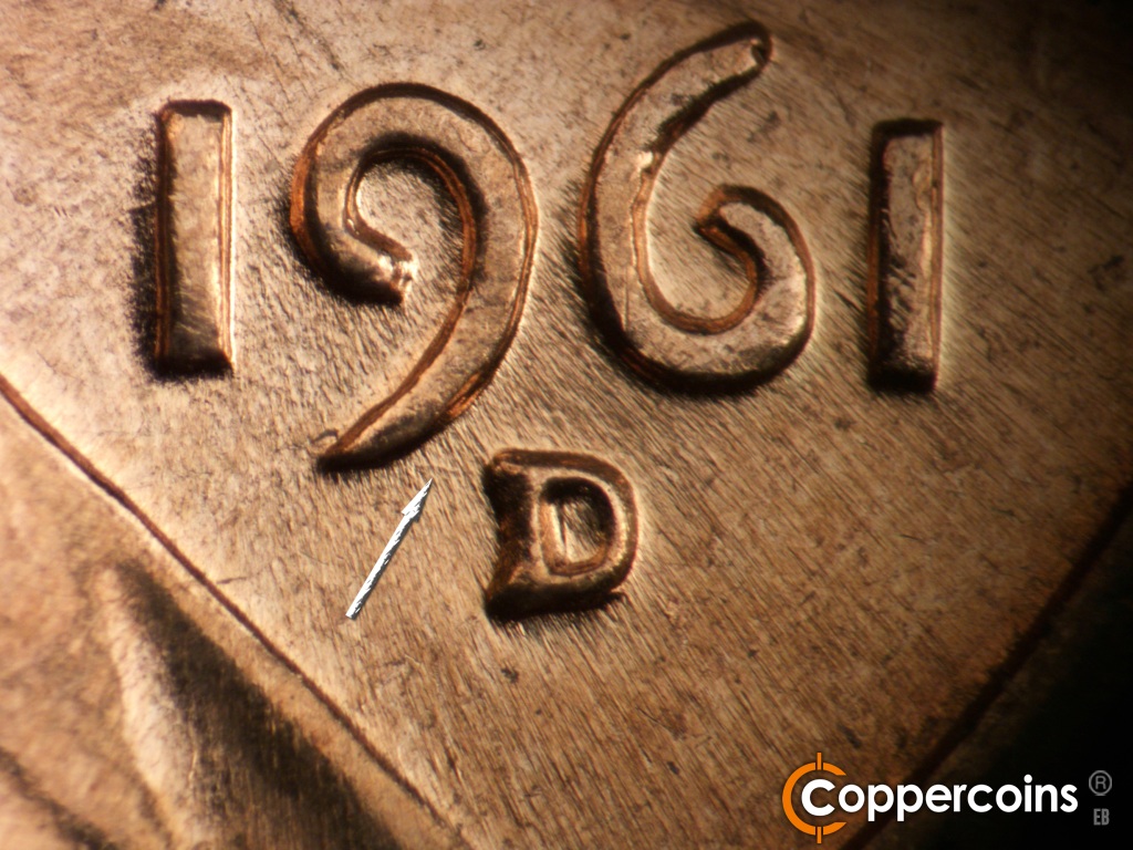 Die-stage A marker on 1961D•1MM•060 showing Closeupo of repunched mint mark. Small die scratch from 9 to mint mark.