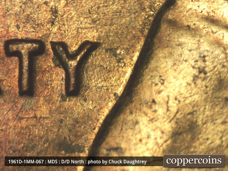 Die-stage B marker on 1961D•1MM•067 (1961 Repunched Mint Mark).