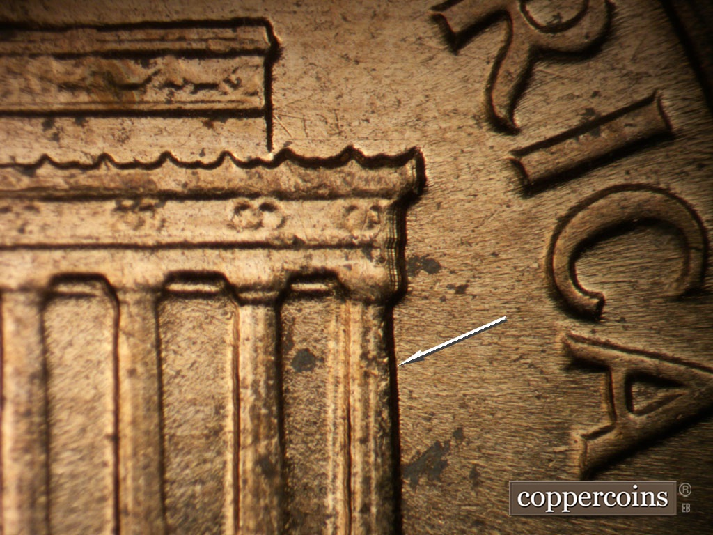 Die-stage B marker on 1961D•1MM•072 showing Die crack down column 12.