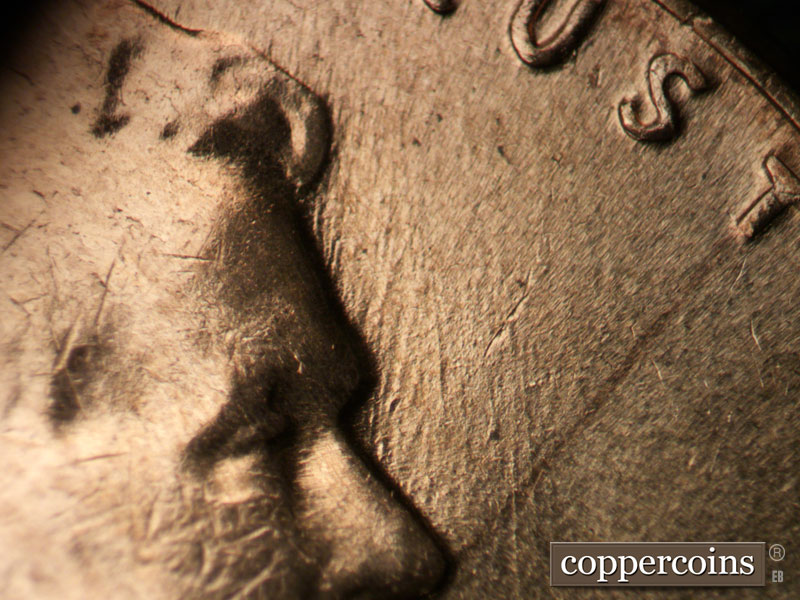 Die-stage C marker on 1961D•1MM•077 (1961 Repunched Mint Mark).