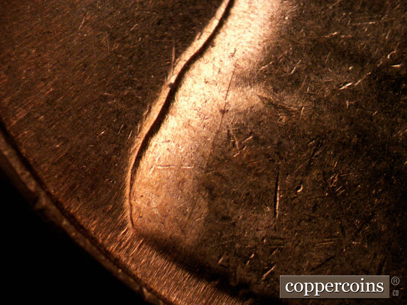 Die-stage B marker on 1961D•1MM•079 (1961 Repunched Mint Mark).
