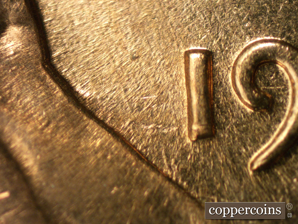 Die-stage B marker on 1961D•1MM•084 (1961 Repunched Mint Mark).