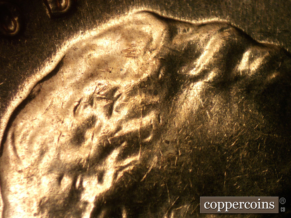 Die-stage B marker on 1961D•1MM•084 (1961 Repunched Mint Mark).