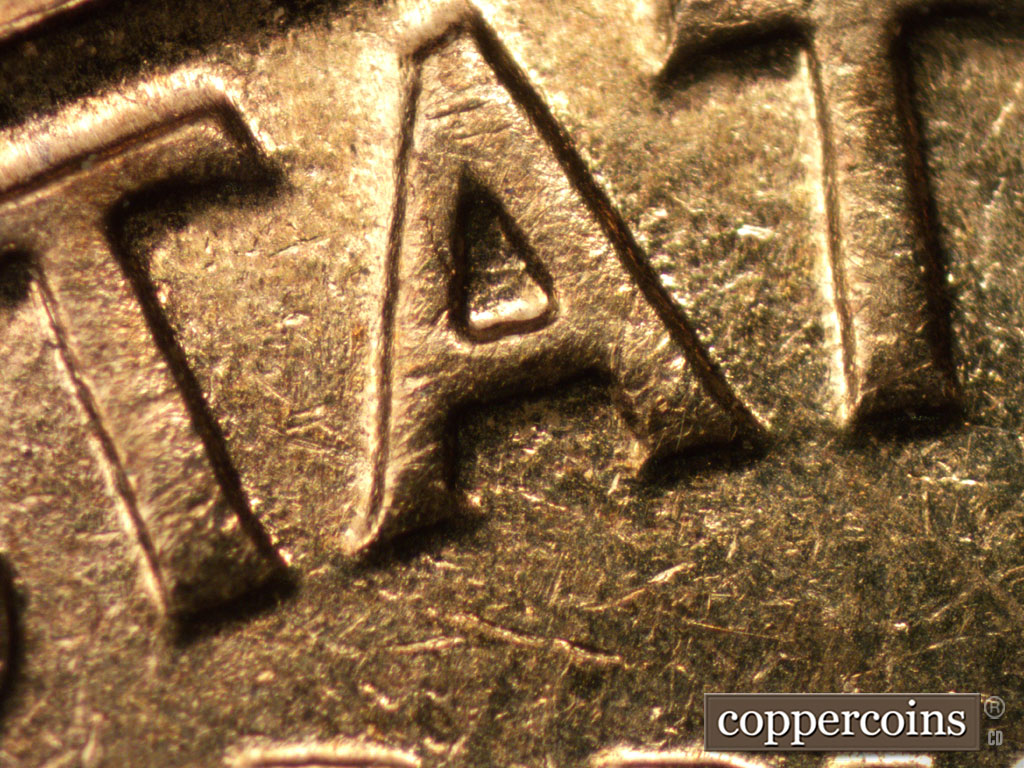 Die-stage B marker on 1961D•1MM•084 (1961 Repunched Mint Mark).