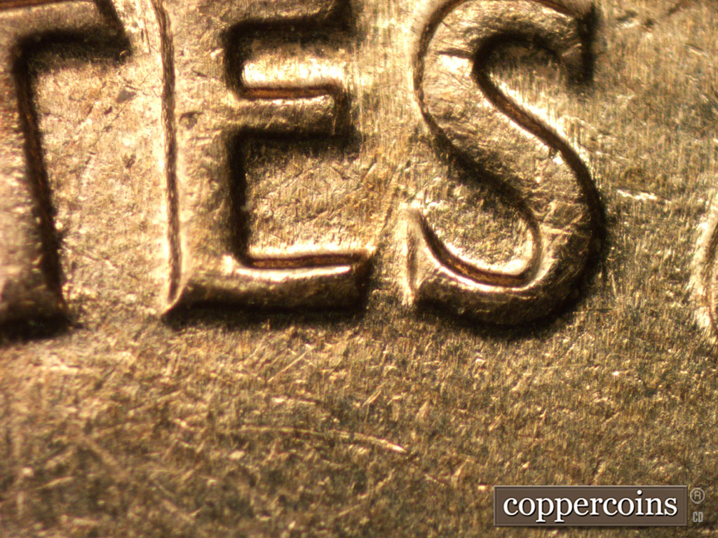 Die-stage B marker on 1961D•1MM•084 (1961 Repunched Mint Mark).