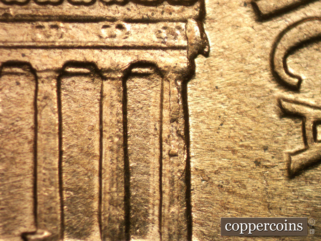 Die-stage B marker on 1961D•1MM•084 (1961 Repunched Mint Mark).