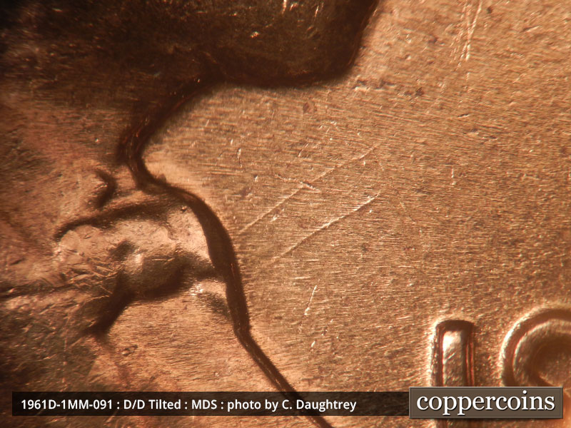 Die-stage B marker on 1961D•1MM•091 (1961 Repunched Mint Mark).