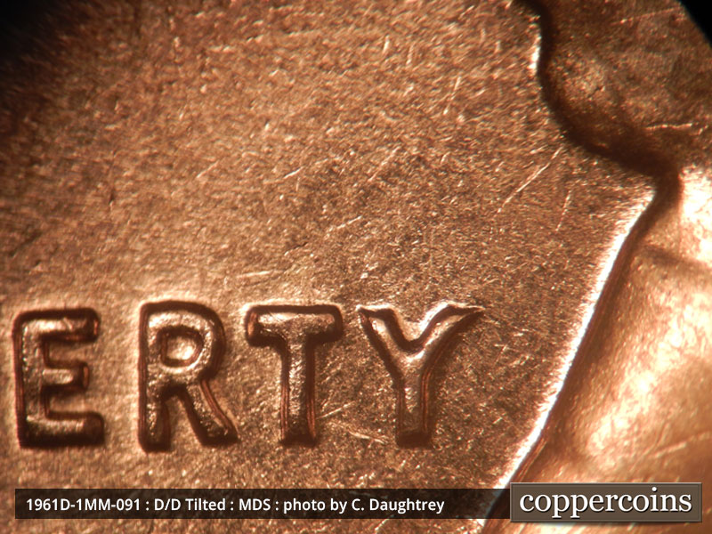 Die-stage B marker on 1961D•1MM•091 (1961 Repunched Mint Mark).