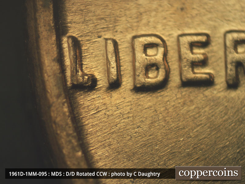 Die-stage B marker on 1961D•1MM•095 (1961 Repunched Mint Mark).