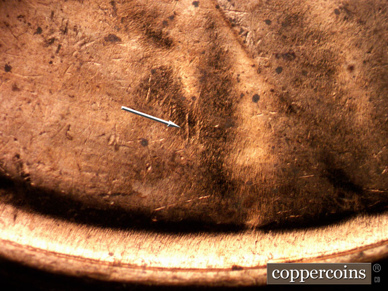 Die-stage B marker on 1961D•1MM•104 (1961 Repunched Mint Mark).