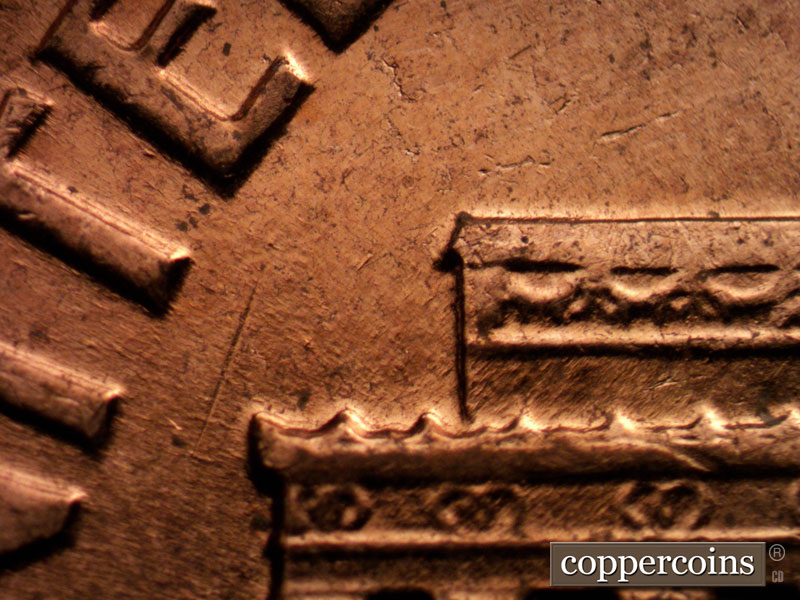 Die-stage B marker on 1961D•1MM•104 (1961 Repunched Mint Mark).
