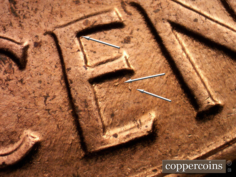 Die-stage B marker on 1961D•1MM•104 (1961 Repunched Mint Mark).