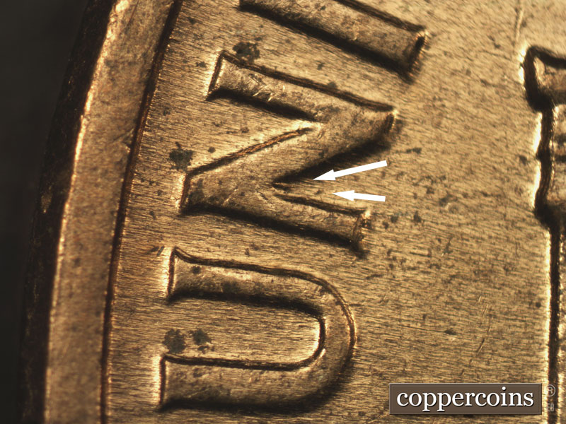 Die-stage C marker on 1961D•1MM•104 (1961 Repunched Mint Mark).