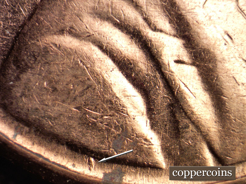 Die-stage B marker on 1961D•1MM•105 (1961 Repunched Mint Mark).