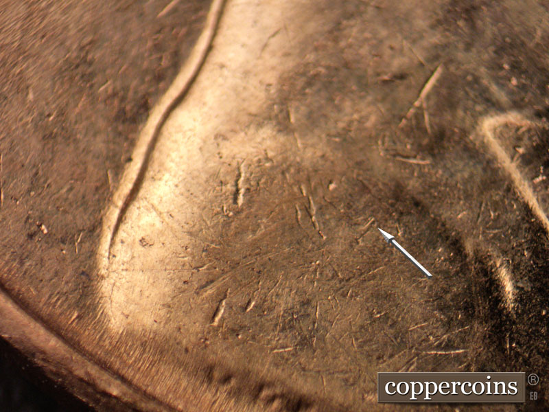 Die-stage B marker on 1961D•1MM•106 (1961 Repunched Mint Mark).