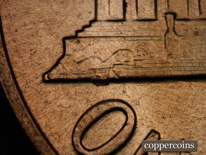 Die-stage B marker on 1961D•1MM•110 (1961 Repunched Mint Mark).