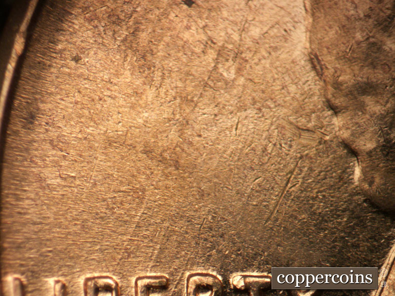 Die-stage B marker on 1961D•1MM•121 (1961 Repunched Mint Mark).