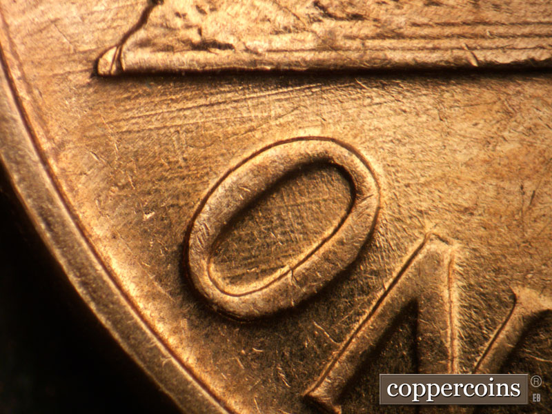 Die-stage B marker on 1961D•1MM•123 (1961 Repunched Mint Mark).