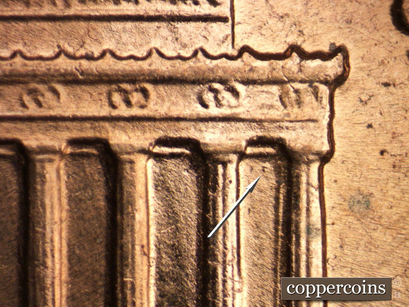 Die-stage B marker on 1961D•1MM•127 showing Die dot visible in upper bay 11.