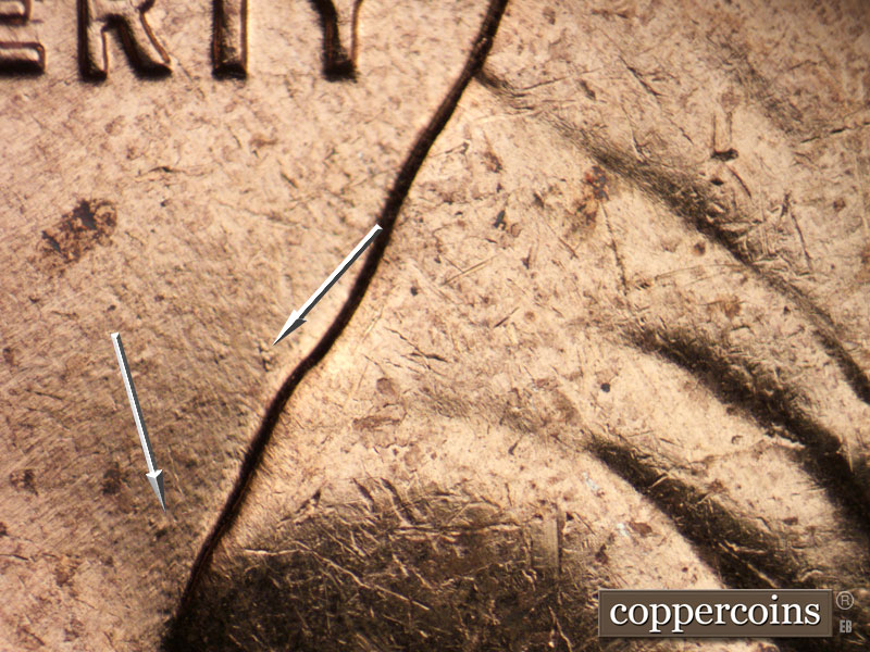 Die-stage B marker on 1961D•1MM•128 (1961 Repunched Mint Mark).