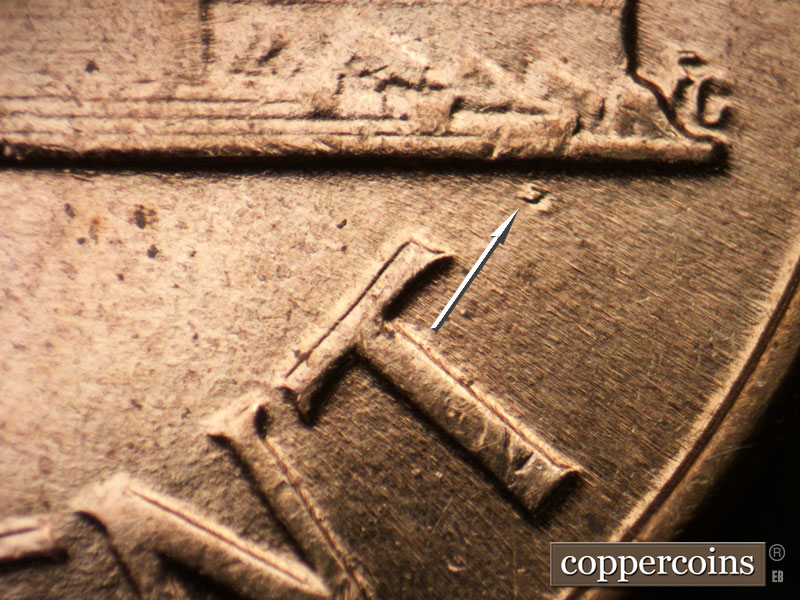 Die-stage B marker on 1961D•1MM•128 (1961 Repunched Mint Mark).