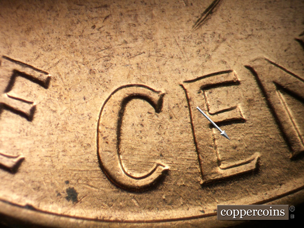 Die-stage B marker on 1961D•1MM•135 showing Die depression visible in lower E of CENT.