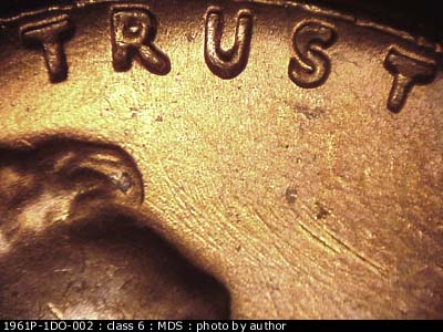 Die-stage B marker on 1961P•1DO•002 (1961 Doubled Die Obverse).
