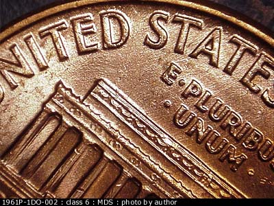 Die-stage B marker on 1961P•1DO•002 (1961 Doubled Die Obverse).