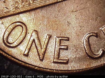 Die-stage B marker on 1961P•1DO•002 (1961 Doubled Die Obverse).