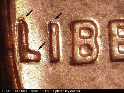 Die-stage A marker on 1961P•1DO•003 (1961 Doubled Die Obverse).